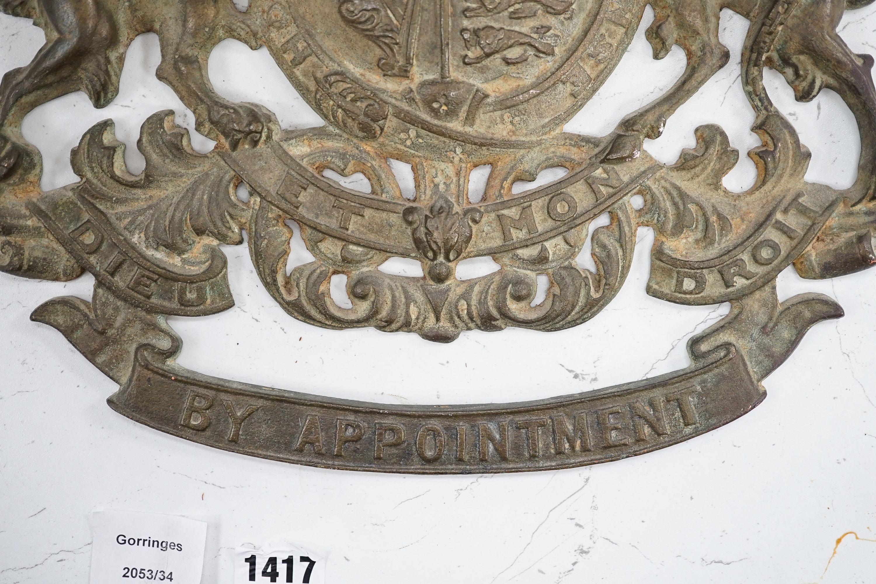 A 'Purveyors of Tea' armorial brass plaque, height 39cm